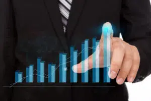 businessman touching tip bar chart 1